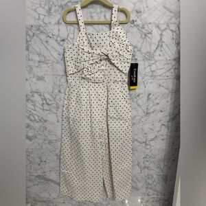 Boohoo White Polka Dot romper by Bebe, size 7/8. NWT